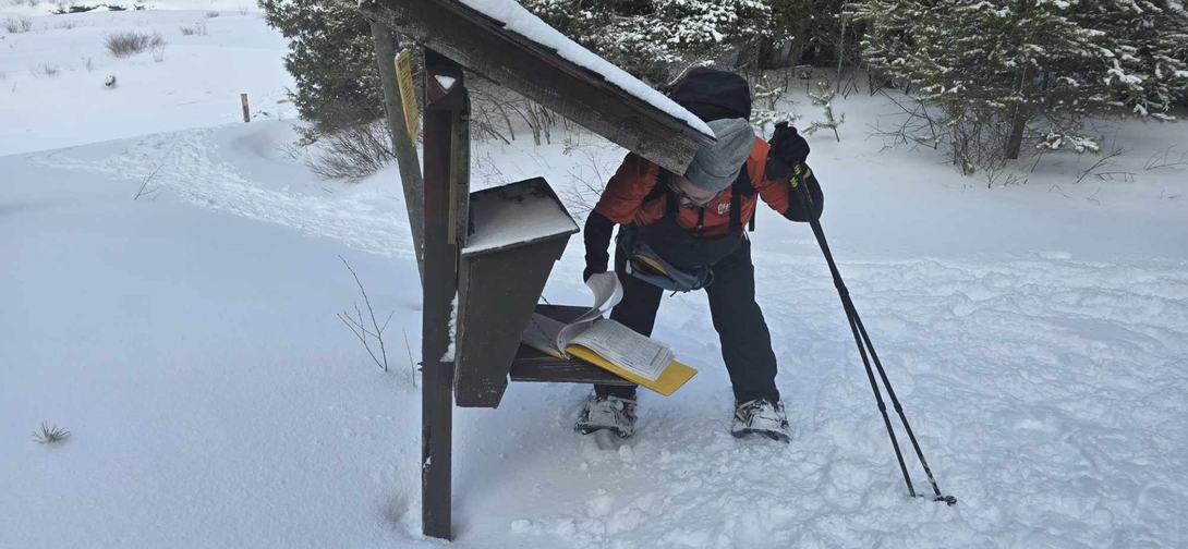 at the trail register under snow